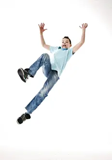Casual Clothing Kids Drucke: A boy leaping into the air