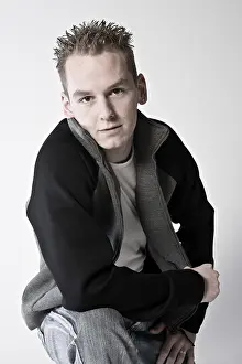 Bright Background Studio Photo Drucke: Boy whos coming to the camera