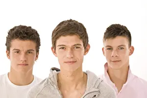 Teenage Boys Drucke: Three boys standing next to each other
