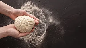 Bread Making Process Drucke: Bread dough with dark background