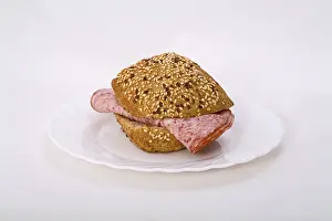 Studio Shot Still Life Drucke: Bread roll with cold cuts