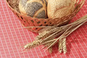 Red Background Food Photography Drucke: Bread rolls in a basket on a red background