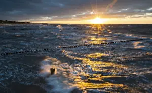Baltic Sea Breakwaters Drucke: Breakwaters or groynes, sunset