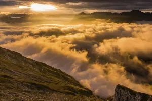Sunrise In Austria Drucke: Bregenzerwald mountains with clouds below