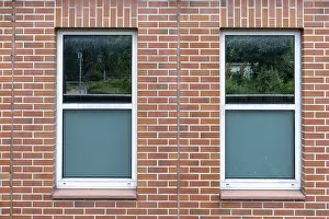 Empty Brick Walls Drucke: Brick house wall with even windows