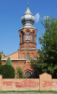 Eastern European Religious Buildings Drucke: Brick tower with clock and cross