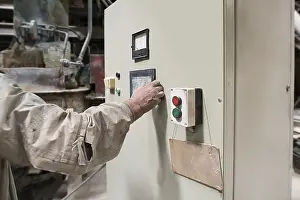 One Person Working Alone Drucke: Brickworks. Master controls machine from remote panel