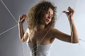 Marriage Love Drucke: The bride has unbuttoned a corset and bare back