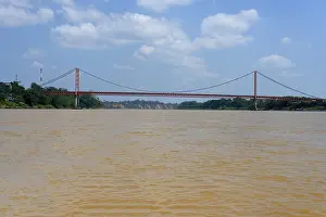Open Air Waterfront Scene Drucke: Bridge over the Madre de Dios River