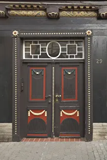 Half Timbered Construction Historic District Drucke: Brown front door with decorations