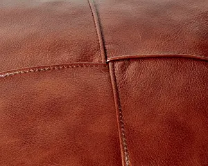 Handicrafts And Crafts Drucke: Brown leather surface with visible stitching creates a textured background