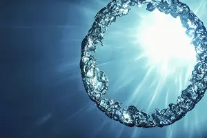 Underwater Ring Drucke: Bubble Ring Underwater ascends towards the Sun