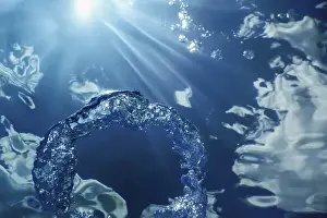 Underwater Ring Drucke: Bubble Ring Underwater ascends towards the Sun