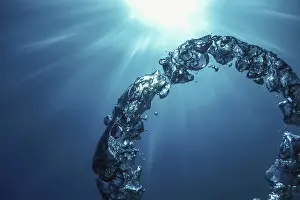 Underwater Ring Drucke: Bubble Ring Underwater ascends towards the Sun