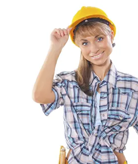 Young Businesswoman Drucke: Builder girl isolated on white