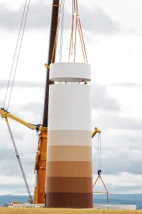 Ecofriendly Renewable Energy Drucke: Building and assembling a construction windmill by crane