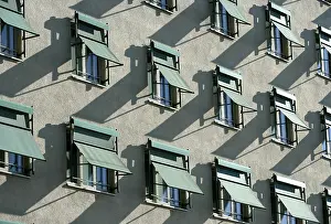 Residential Building Architecture Drucke: Building facade, shutters on the windows