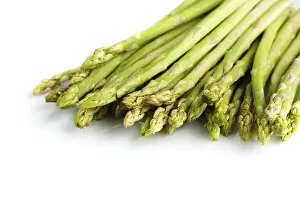Fresh Asparagus Drucke: Bundle of fresh asparagus on white background