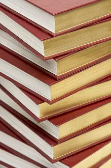 France Travel Images Drucke: Burgundy covered stack of books close up