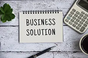 Conceptual Photo Symbolism Drucke: Business solution on notepad. Business solution concept