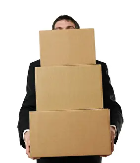 Caucasian Male In Studio Shot Drucke: Businessman overloaded with a stack of boxes