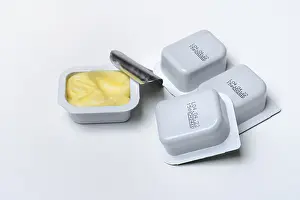 Empty Breakfast Dish Drucke: Butter in breakfast portion, portion pack