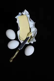 Dairy Product Still Life Drucke: Butter in opened packaging and eggs