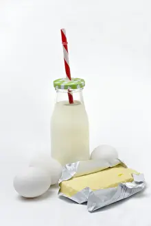 Grocery Store Backgrounds Drucke: Butter in opened packaging, eggs and bottle of milk