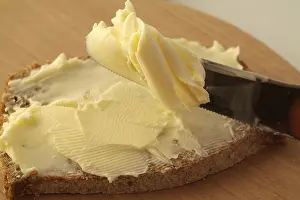 Freshly Baked Bread Drucke: Buttered bread