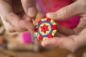 German Handicrafts Drucke: Button maker stitching and wrapping green