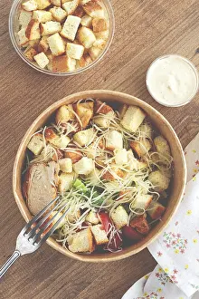 Natural Light Drucke: Caesar salad in a paper container