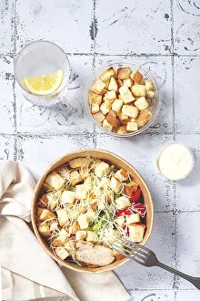 Appetizing Food Still Life Drucke: Caesar salad in a paper container