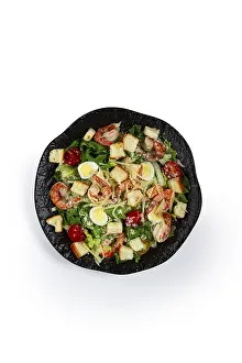 Crustacean Dish Drucke: Caesar salad with tiger prawns