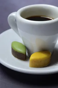 French Almond Confectionery Drucke: Calisson d'Aix and cup of coffee