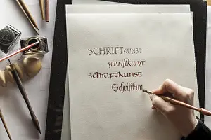Traditional German Crafts Drucke: Calligraphy studio, hand writes text with ink
