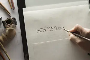 Handmade Calligraphy Drucke: Calligraphy studio, hand writes text with ink