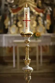 Religious Building Photography Drucke: Candle burning in front of an altar
