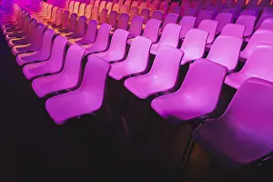 Interior Decoration Ideas Drucke: A captivating array of pink chairs in neat rows