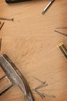 Rustic Wooden Background Drucke: Carpenter tools on a rustic wooden background with space for text