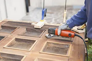 Carpenter At Work Drucke: Carpenter at work with angular Sander