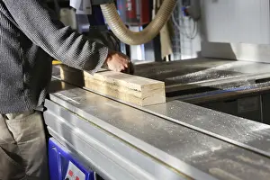 Woodworking Equipment Drucke: Carpenter at work in his carpentry workshop