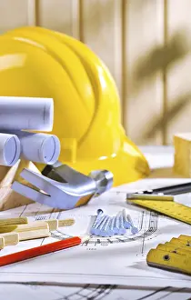 Construction Project Planning Drucke: Carpentry tools on table with blueprints