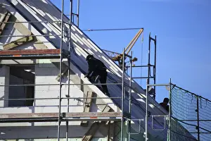 Residential Building Construction Drucke: Carpentry work on a residential building under construction