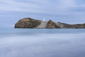 Long Exposure Ocean Waves Drucke: Castlepoint Beach with lighthouse on the rock