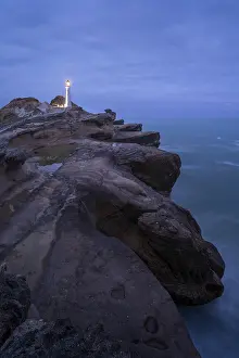 Lighthouse At Sunset Drucke: Castlepoint lighthouse on a rock