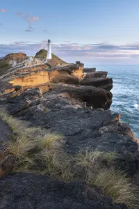Atmospheric Coastal Scenery Drucke: Castlepoint lighthouse on a rock