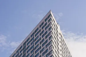 Contemporary Architectural Design Drucke: Angle of the Skyscraper on the Cloudy Sky Background