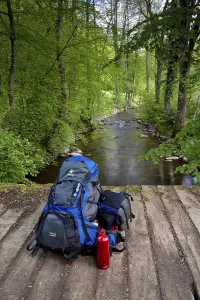 Black Forest Hiking Trails Drucke: Backpack with a drinking bottle during a break