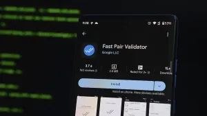 Mobile Phone Technology Drucke: Fast Pair Validator app interface shown on smartphone in dark interface