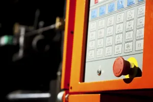 Industrial Building Design Drucke: Complex machine computer control panel with emergency button